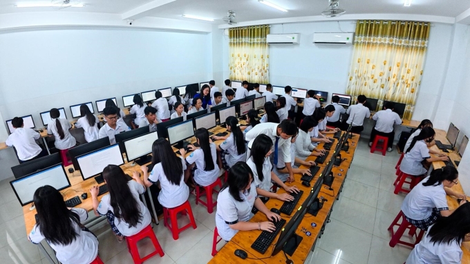 2-1750653879-2927-1750667870 Giờ tin học của học sinh cơ sở 5 trường Trần Cao Vân tại 41 Giang Cự Vọng, Phường Trung Mỹ Tây, TP HCM. Ảnh: Trọng Tín