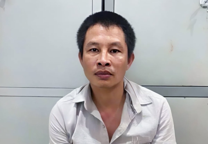 280b8567-c0a7-467d-a20c-bd829a-9527-6618-1750899875 Trần Văn Dụng tại cơ quan điều tra. Ảnh: Hùng Lê
