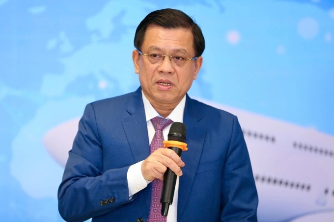hinh-anh-2-1751027263-5924-1751027355 Ông Nguyễn Bá Hoan tại một buổi tọa đàm ở Hà Nội, tháng 12/2024. Ảnh: Hoàng Triều