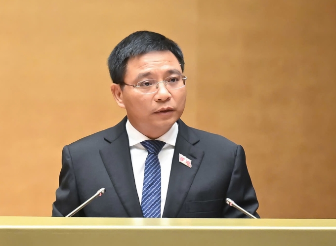 nguyen-van-thang-11-6-17496198-7357-6469-1749620073 Bộ trưởng Tài chính Nguyễn Văn Thắng trình bày tờ trình dự thảo Nghị quyết về Trung tâm tài chính quốc tế ở Việt Nam, sáng 11/6. Ảnh: Trung tâm báo chí Quốc hội
