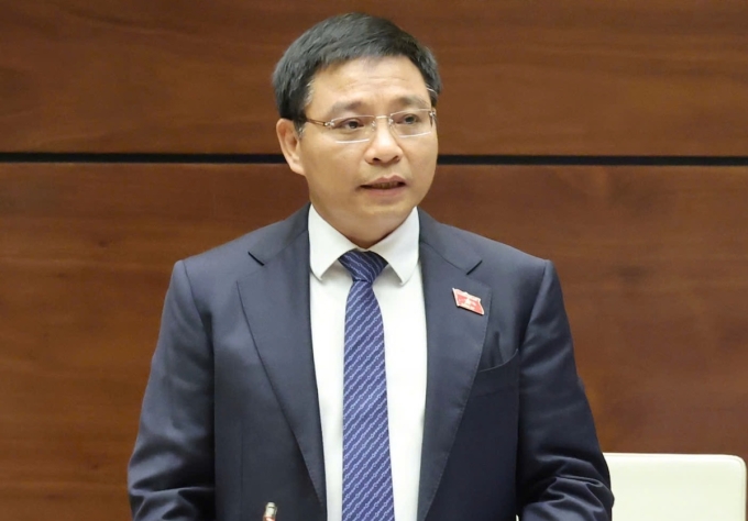 nguyen-van-thang-24-6-17507412-8709-3008-1750741382 Bộ trưởng Tài chính Nguyễn Văn Thắng giải trình tại phiên thảo luận, ngày 24/6. Ảnh: Giang Huy