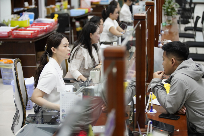 vne6653-jpg-2081-1750695709 Công chức làm việc tại Trung tâm hành chính TP Đà Nẵng, tháng 5/2025. Ảnh: Nguyễn Đông